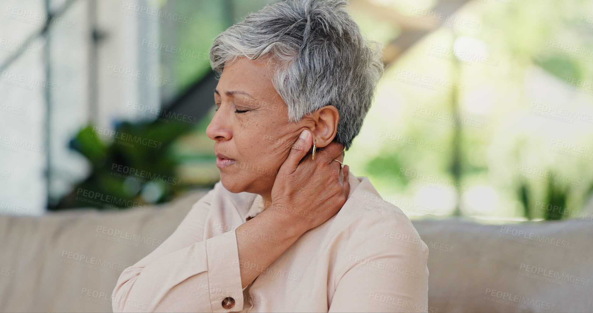 Buy stock photo Senior, woman and stress with neck pain in home with muscle tension, poor posture or discomfort. Elderly person, medical injury or joint ache on sofa with arthritis, nerve damage or retirement strain