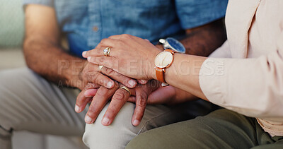 Buy stock photo Hands, love and support with couple on sofa in living room of home, bonding and closeup. Empathy, respect and trust with people in apartment together for gratitude, kindness or relationship;