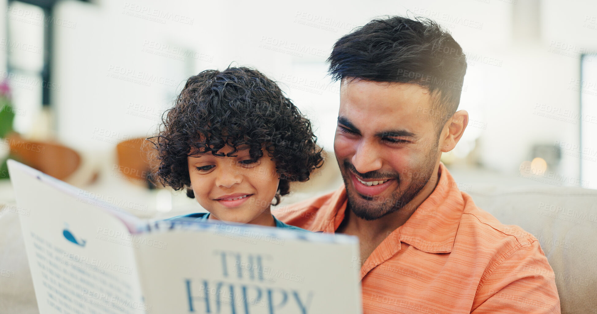 Buy stock photo Father, boy and reading book on couch, smile and learning with storytelling, development and literature. Dad, child and happy with language on sofa, support and excited for education in family house