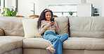 Home, child and girl with smartphone for game, streaming online and watching video on social media. Sofa, female person and kid with mobile for application, digital reel and relax with smile on couch