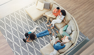 Buy stock photo Bonding, relax and streaming with family on sofa in living room of home together from above. Coffee, conversation or visit with children, parents and grandparents in apartment for break or holiday
