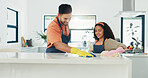 Father, girl and cleaning table kitchen for housekeeping, counter disinfection and learning responsibility. Family, chores and people with gloves for bacteria removal, bonding or helping hand in home