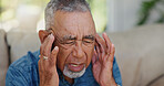 Stress, headache and senior man in home with worrying, overthinking or mental health. Anxiety, mistake and elderly male person with migraine in living room for regret, vertigo or brain fog in house.