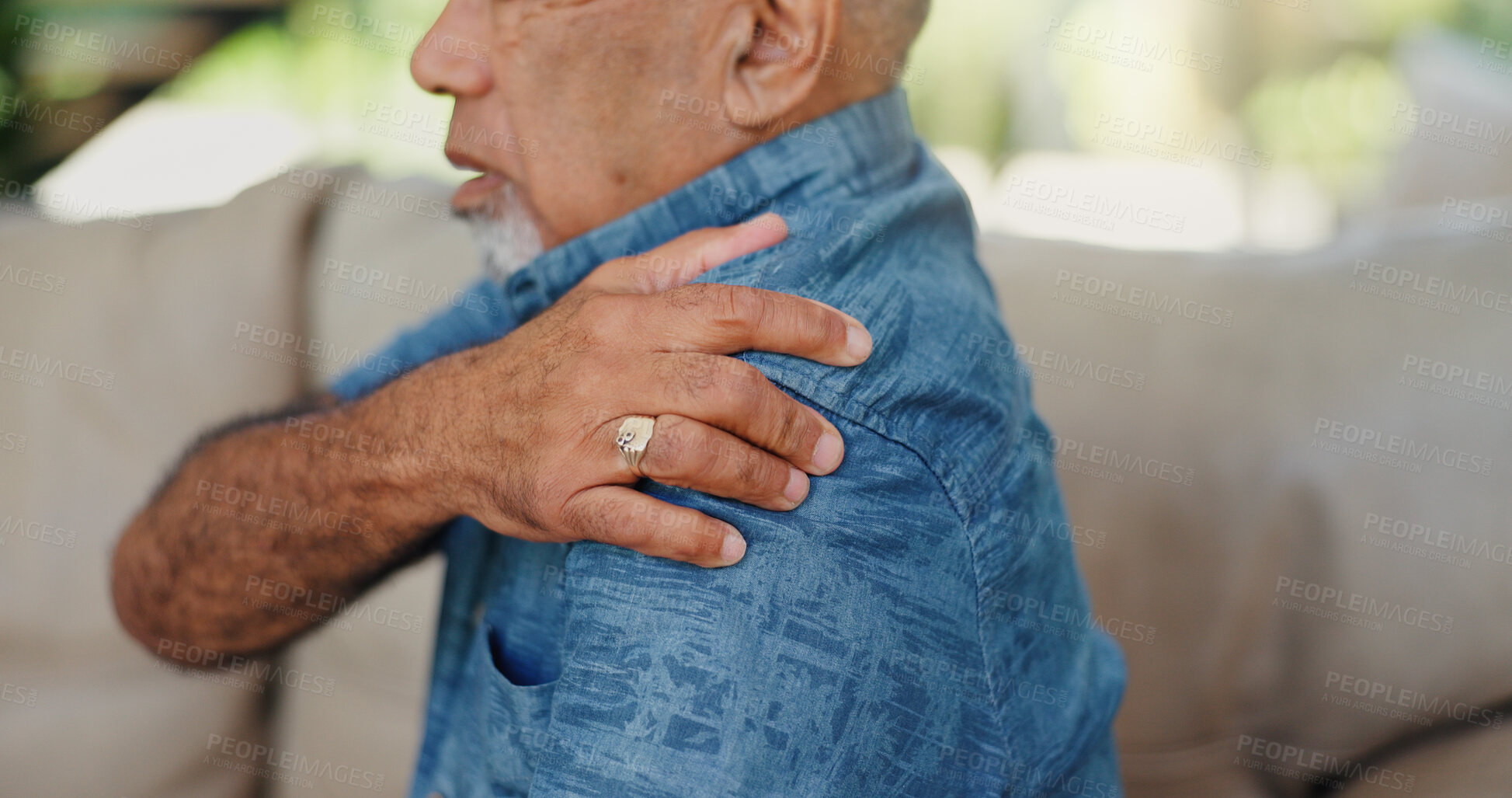Buy stock photo Senior, man and hands on shoulder pain on sofa with muscle tension, arthritis or osteoporosis. Elderly person, arm injury and joint ache in home with tendinitis, nerve damage and sprain in retirement
