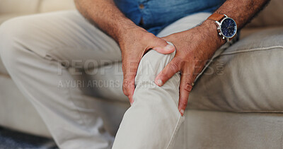 Buy stock photo Senior, man and hands with knee pain on sofa for arthritis, muscle discomfort or osteoporosis. Closeup, elderly person or massage joint ache in home with tendinitis, ligament fracture or nerve damage