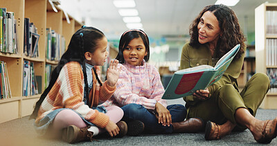 Buy stock photo Girl, teacher and teaching with reading book at library for development, learning or study with guide. School kids, storytelling and woman with help, education and language for knowledge at academy