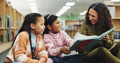 Buy stock photo School kids, teacher and happy with book at library for development, learning and education on floor. Children, reading and storytelling with woman for help, excited or teaching language at academy