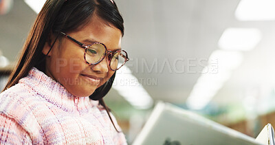 Buy stock photo Education, smile and kid reading book in library for learning skill, knowledge and info at school. Child, girl and student study textbook to research for project, development or language improvement