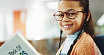 Girl, kid and portrait with reading book at library for education, learning or glasses for storytelling. School child, happy and scholarship for language, knowledge and development at in Costa Rica