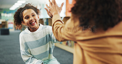Buy stock photo High five, smile and child with teacher, school and celebration for knowledge, growth and development. Elementary, student and happy for learning in library, scholarship or conversation for education