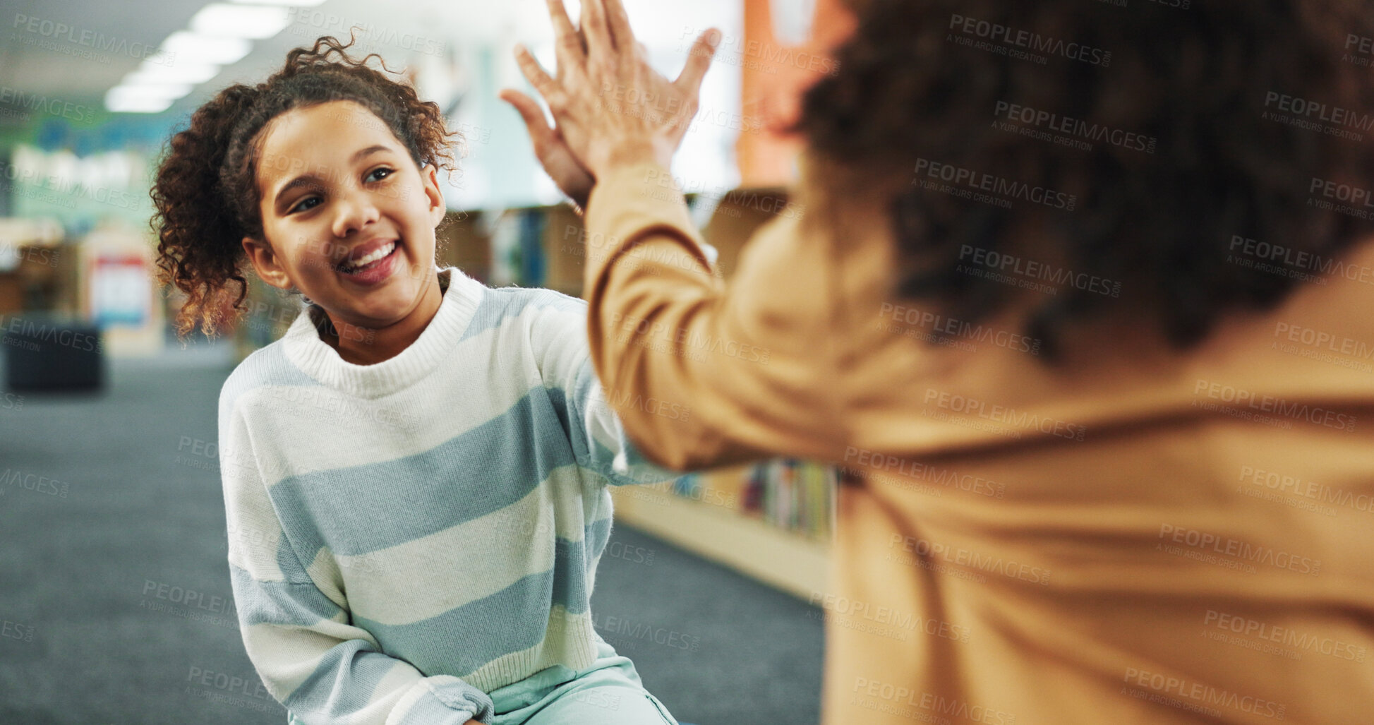 Buy stock photo High five, smile and child with teacher, school and celebration for knowledge, growth and development. Elementary, student and happy for learning in library, scholarship or conversation for education