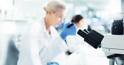 Buy stock photo Healthcare, microscope and science with people in laboratory for innovation, investigation or research. Equipment, medical and pharmaceuticals with scientist group at work on clinical trial or study