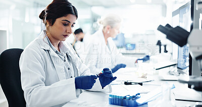 Buy stock photo Woman, scientist and DNA test with blood sample for exam, medical discovery or clinic results at laboratory. Female person, doctor or research with RNA for analysis, cure or investigation at lab