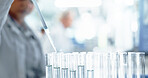 Person, scientist and tubes with samples for medical research, clinic trial or chemical testing at lab. Closeup, doctor or science with chemistry for new medicine, discovery or results at laboratory