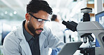 Tablet, man and scientist with microscope in laboratory for online research with DNA for medical innovation. Biotechnology, goggles and male biologist with RNA for pharmaceutical study or discovery.