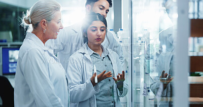 Buy stock photo Glass wall, brainstorming and people in lab, research and collaboration for experiment. Science, group and employees in workplace, cooperation and review chemistry equation with medical results