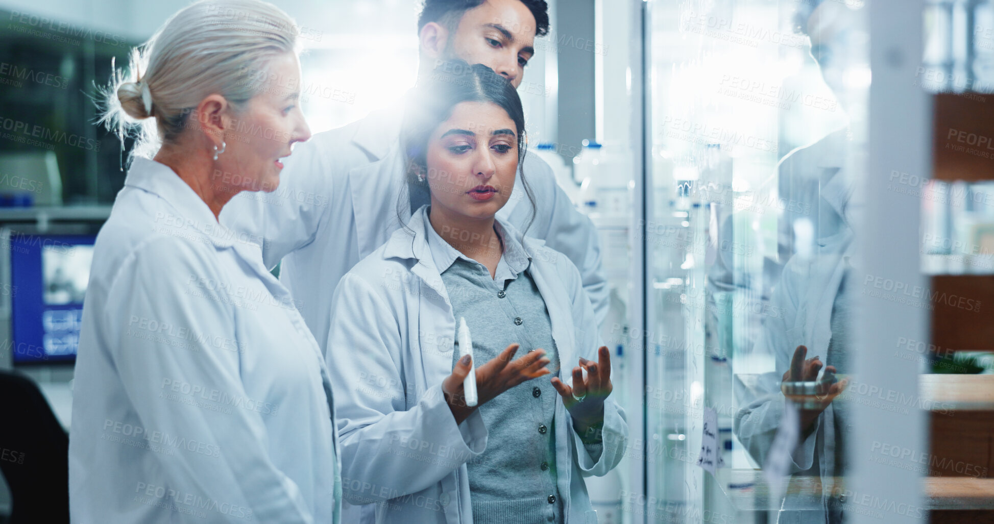 Buy stock photo Glass wall, brainstorming and people in lab, research and collaboration for experiment. Science, group and employees in workplace, cooperation and review chemistry equation with medical results