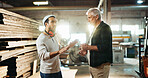 Collaboration, planning and talking with carpenter men in workshop for manufacturing or production. Carpentry, industry and teamwork with woodworking people in factory together for conversation