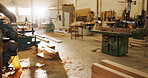 Machinery, wood and carpentry in empty workshop of furniture manufacturing, renovation and labor. Material, plank and crafting production for woodwork, remodeling maintenance and restoration industry