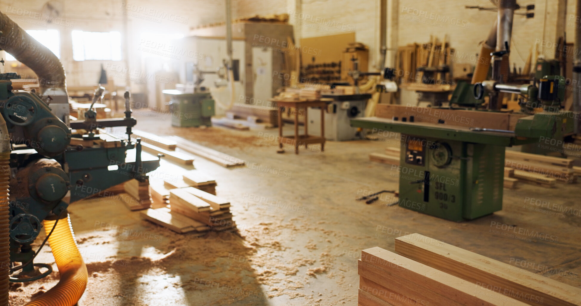 Buy stock photo Machinery, wood and carpentry in empty workshop of furniture manufacturing, renovation and labor. Material, plank and crafting production for woodwork, remodeling maintenance and restoration industry