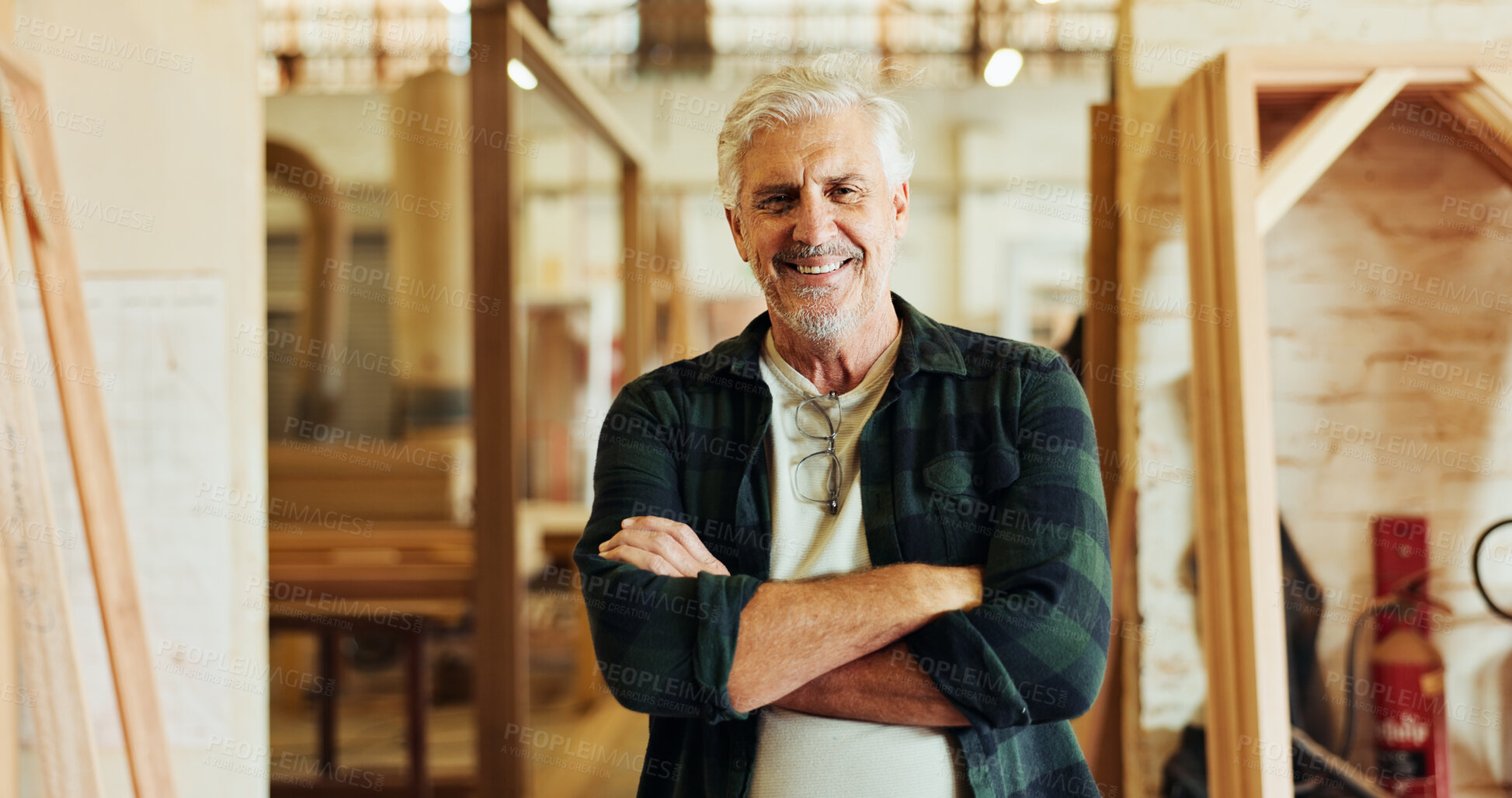 Buy stock photo Workshop, man and carpenter in portrait for arms crossed, wood manufacturing and production business. Happiness, mature contractor and pride with furniture for service, maintenance and timber craft