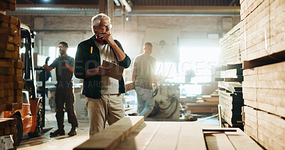 Buy stock photo Carpenter, notes and thinking of wood in workshop for timber inspection, quality control and stock checklist. Manufacturing industry, mature man and clipboard for inventory management or supply chain