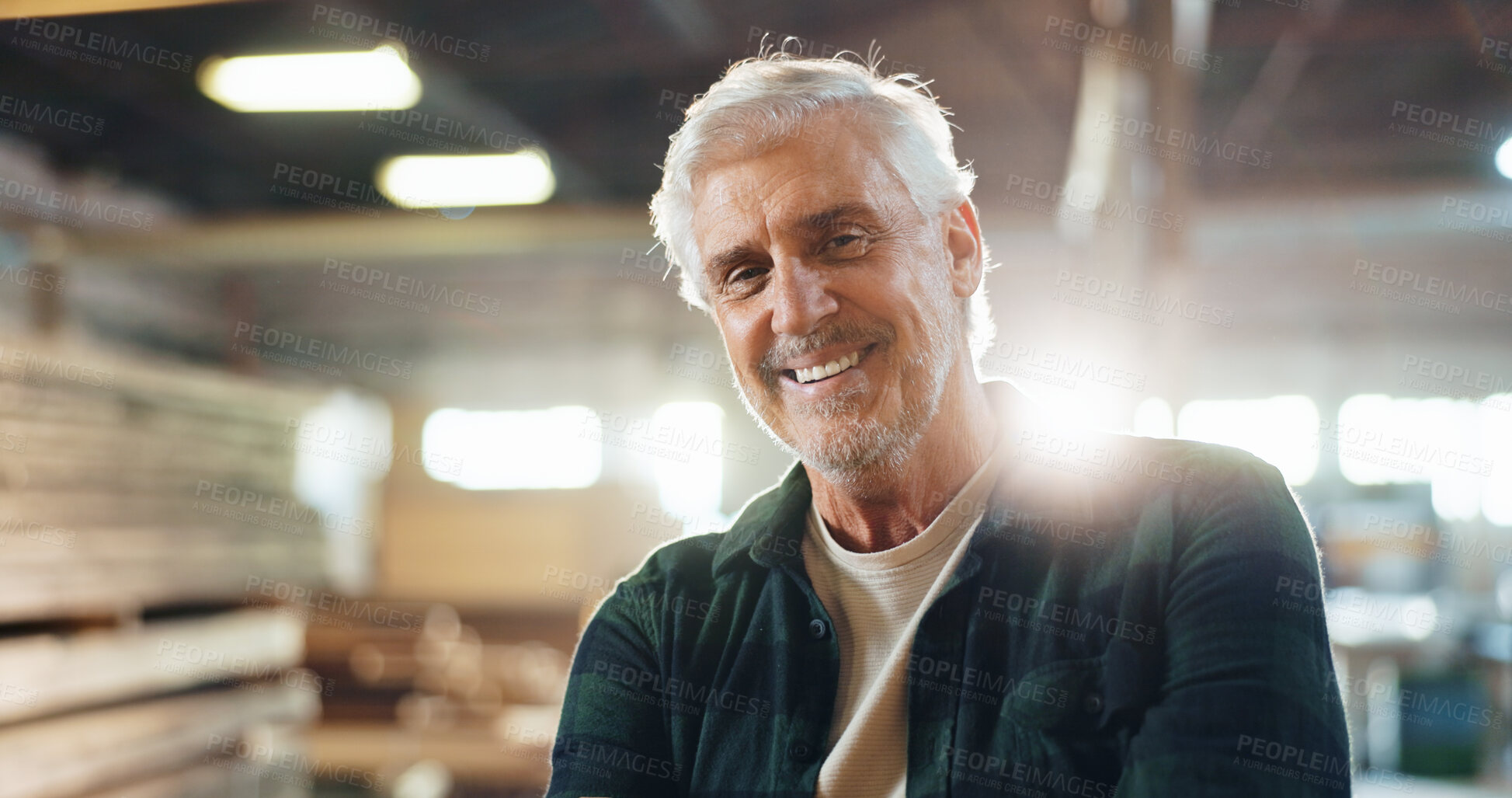 Buy stock photo Portrait, mature and happy man as carpenter in workshop, wood manufacturing and production business. Warehouse, male person and contractor with smile for professional service, maintenance and craft