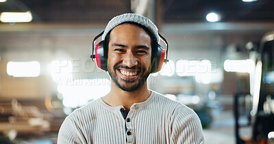 Buy stock photo Carpenter, man and portrait with headphones in workshop for woodwork, furniture production or hearing protection. Manufacturing industry, worker and happy in warehouse for carpentry or small business