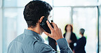 Phone call, office and back of business man for communication, contact and online discussion. Professional, corporate worker and person talking on smartphone for networking, planning and conversation