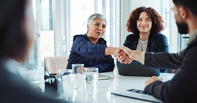 Buy stock photo Happy, business people and meeting with handshake for agreement, deal or partnership at office. Businessman, woman or colleagues shaking hands with team for introduction or greeting at workplace