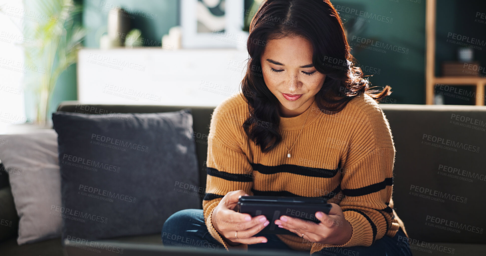 Buy stock photo Tablet, freelancer and woman in home for editing, review or journalist check social media story. Digital technology, smile and remote work with app for report, news and research article on internet