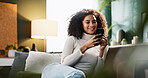 Relax, message and woman with smartphone, home and smile for communication with contact and online. Comfortable, reading and person with mobile for chat, happy and girl with tech for texting in house