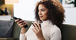 Happy woman, coffee or watching tv with remote on sofa for entertainment, show or series at home. Female person, relax or online streaming for movie with caffeine, drink or beverage on couch at house