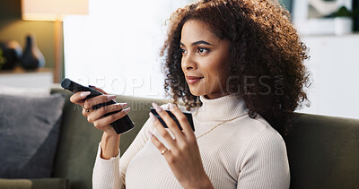Buy stock photo Happy woman, credit card and watching tv with remote on sofa for online subscription at home. Female person, relax and smile with debit or banking app for movie purchase, payment or entertainment