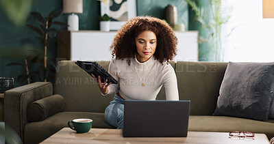 Buy stock photo Home, woman and tablet with laptop for remote work, editing information and content writer on sofa. Freelancer, female person and journalist with digital for interior newspaper, article or blog story