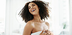 African woman, laughing and hair care in bathroom with smile for grooming, growth and volume in home. Shampoo, morning and afro person with confidence, cosmetics results or curly texture for beauty