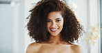 African woman, portrait and hair care in bathroom with smile for grooming, growth and volume in home. Shampoo, morning and afro person with confidence, cosmetics results or curly texture for beauty