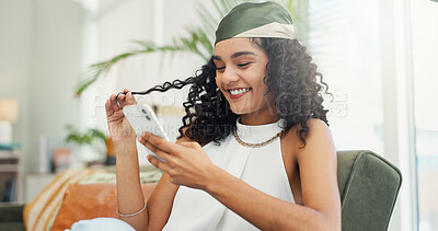 Buy stock photo Designer, phone and social media with business woman in office for communication, good news or update. App, smile and text message with employee on sofa in creative workplace for notification