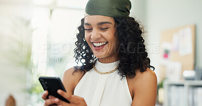 Buy stock photo Designer, phone and smile with business woman in office for communication, good news or update. App, social media and text message with employee laughing in creative workplace for notification