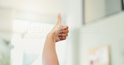 Buy stock photo Thumbs up, hand and person in home, opinion and closeup of gesture for vote, thank you and living room. Feedback, review and agreement with yes in house, praise and sign for approval in lounge