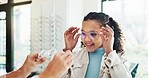 Happy girl, glasses and optometry with lens for eyesight, vision aid or care at optometrist. Little child, kid or spectacles with smile for eyewear advice, service or assistance at optician store