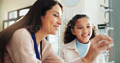 Buy stock photo Optometry, glasses and woman with child for decision of frames, prescription lens and spectacles for sight. Healthcare, ophthalmology and optician with girl for eye care, vision and medical service