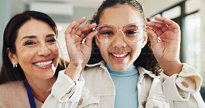 Buy stock photo Optician, child and portrait with glasses shopping for vision, prescription lens and happy with frame fitting. Optometry, woman and girl customer with designer eyewear, spectacles choice and eye care