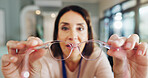 Eyewear, portrait and pov of customer with optometrist in hospital for appointment or checkup. Frame, hands and prescription lenses with happy woman in clinic for glasses, optometry or vision