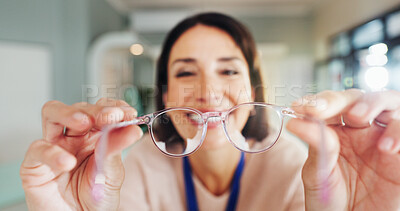 Buy stock photo Customer, glasses and portrait with hands of optometrist in office for appointment or checkup. Frame, POV and prescription lenses with smile of happy woman in clinic for eyewear, optometry or vision