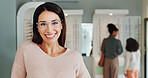 Choice, portrait or woman with glasses at retail for optometry, eyewear or shopping. Female person, frames and checking spectacles at store for sight, vision or decision at optician or optometrist