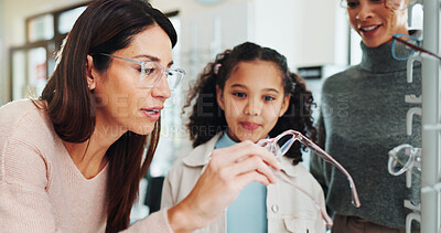 Buy stock photo Optician, mother and child with glasses choice in optical store for prescription lens, frame style and vision. Eyewear shopping, optometry and girl customer with spectacles fitting and health service