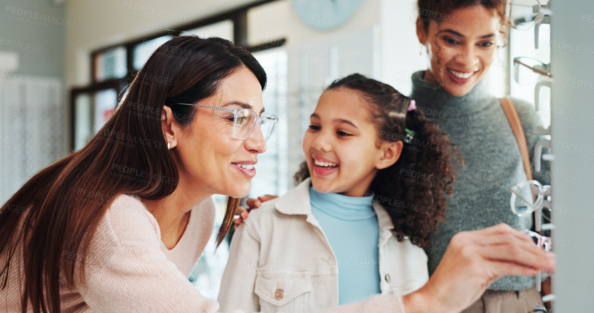 Buy stock photo Optician, mother and girl with glasses choice in retail store for prescription lens, frame decision and eye care. Eyewear shopping, optometry and happy child with spectacles fitting or health service