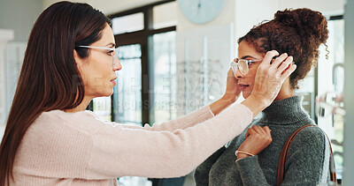Buy stock photo Shopping, woman and optician helping with glasses in optical store for frame fitting, eyewear choice and option. Optometry service, person or customer with spectacles assistance for vision correction