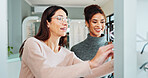 Optometry, woman and customer with glasses shopping for eye care, prescription lens and frame choice in optical store. Eyewear fitting, optician and happy person with spectacles sale and healthcare